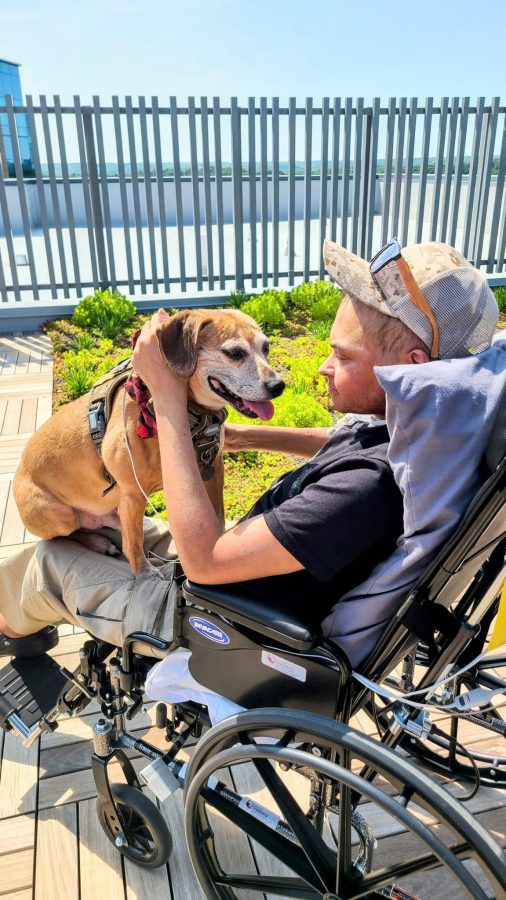 Image from Matthew's Moment - Matthew with a dog