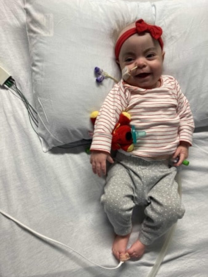 Image of Nora lying in the bed