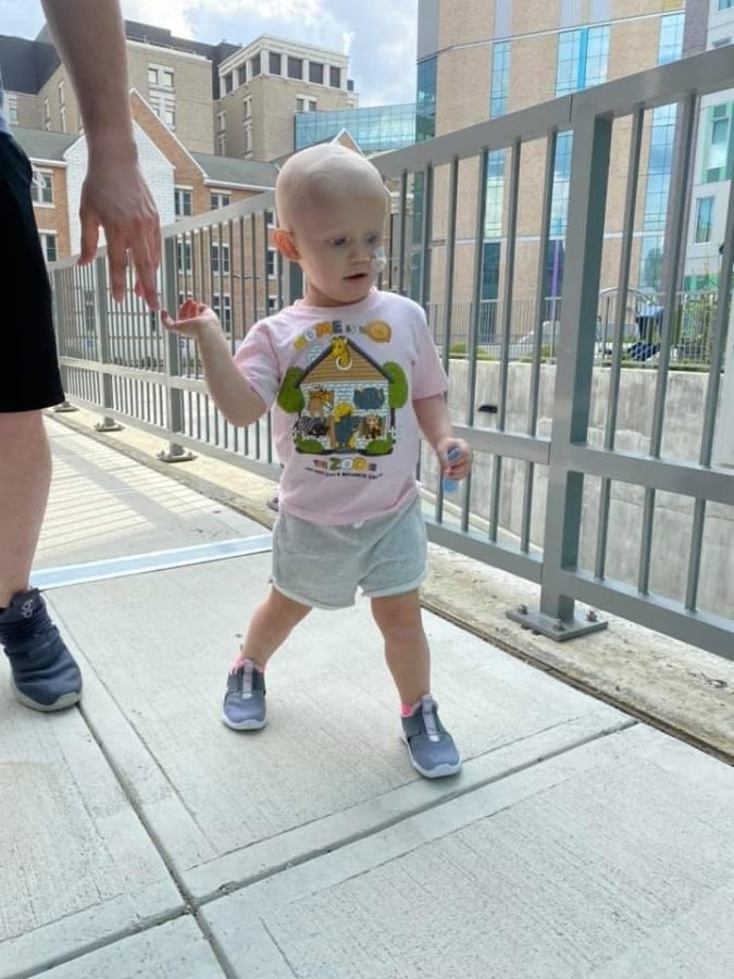 eryn-with-house-in-background