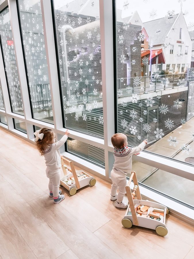 Image from Comfort and Joy - Two children pointing from the window