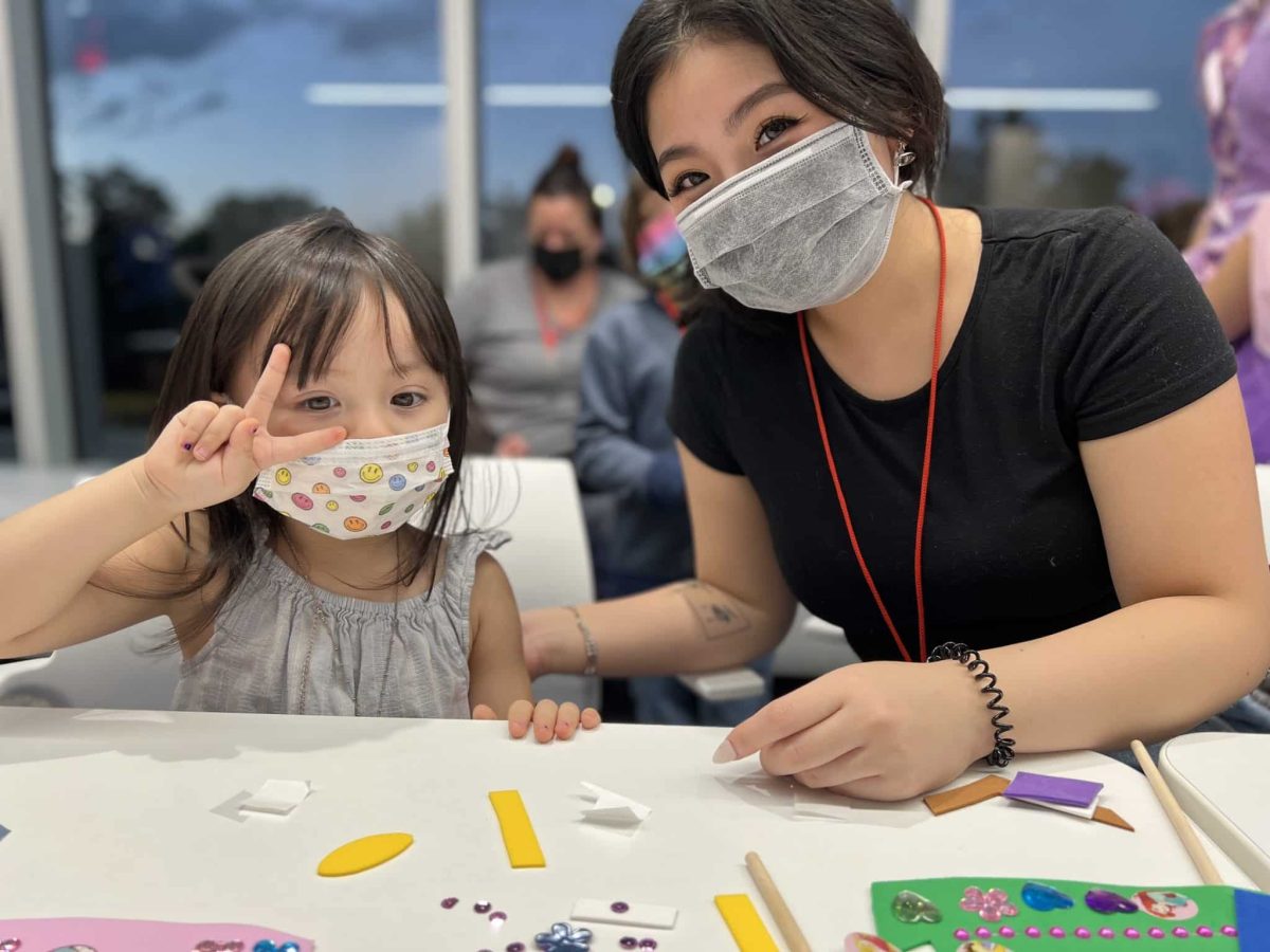 Image from Moments of Joy - Girl making a peace sign