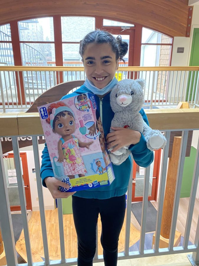Image of Khloe with her toys