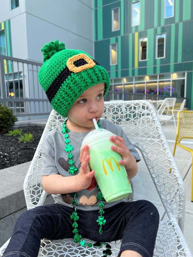 Image of Paisley sipping a drink