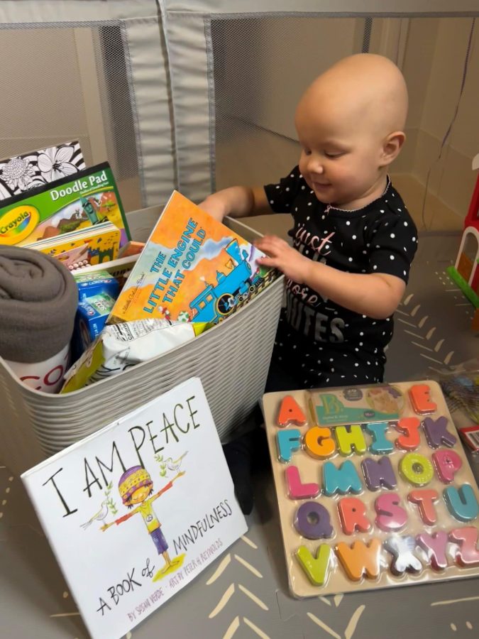 Image of Paisley with her books