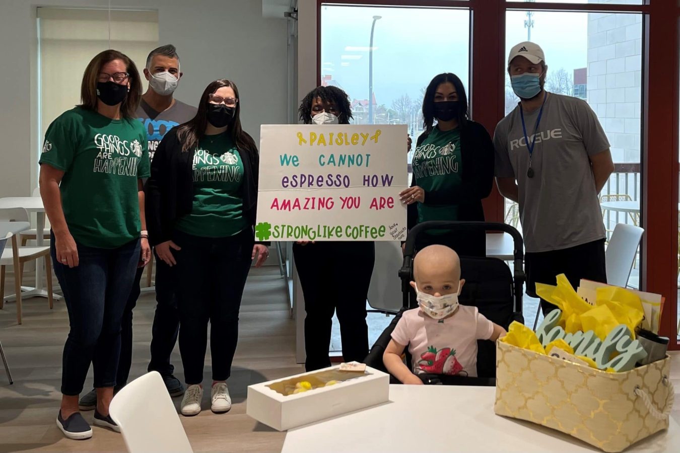 Image of Paisley with Starbucks staff