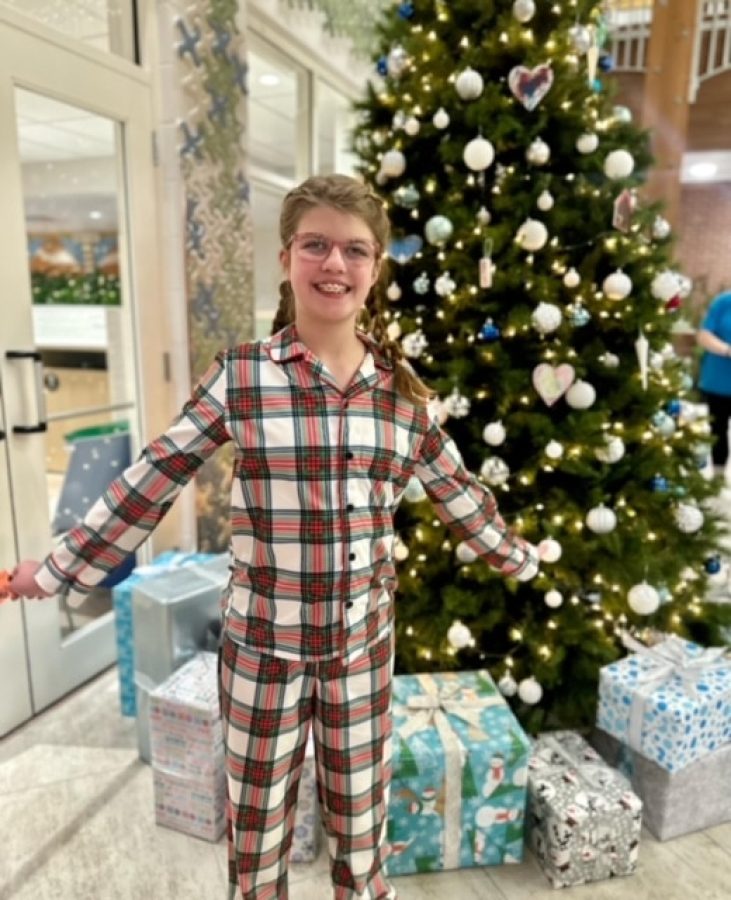 Image from Comfort and Joy - Girl in a Christmas Tree