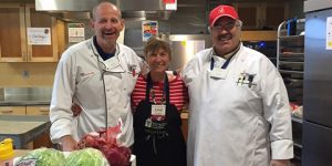 img-taste-of-hope Two Chefs and a volunteer in the kitchen