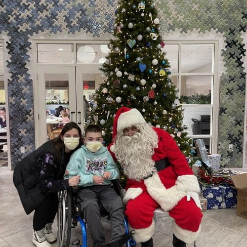 Adult and child with Santa